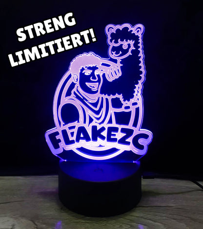 Limitierte Flakezc 3D-LED-Lampe mit lila Leuchteffekt und Logo-Motiv – exklusives Highlight für die Community.