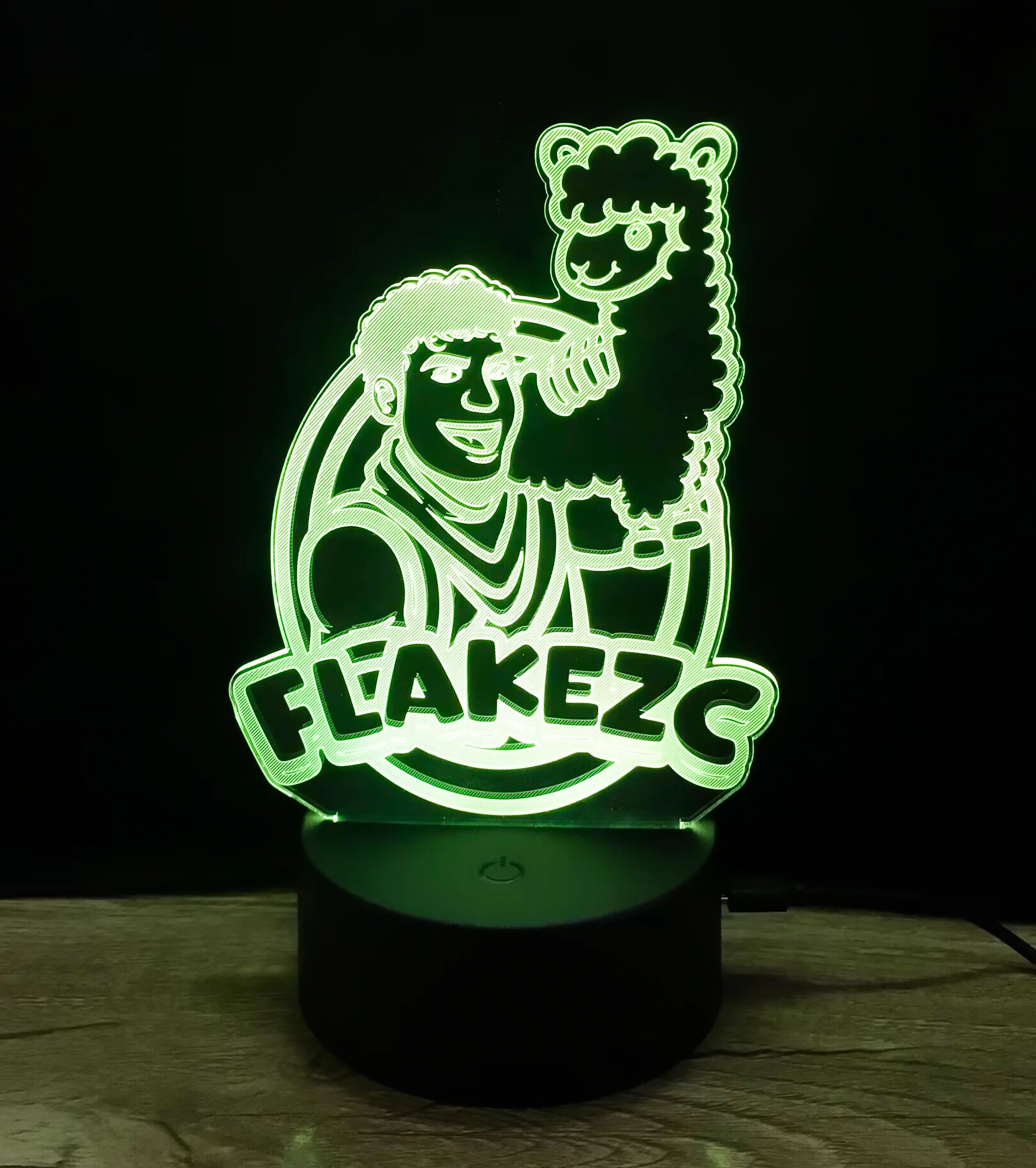 Flakezc 3D-LED-Lampe mit grünem Lichteffekt und Logo-Motiv – auffällige Leuchtdeko für die Community.